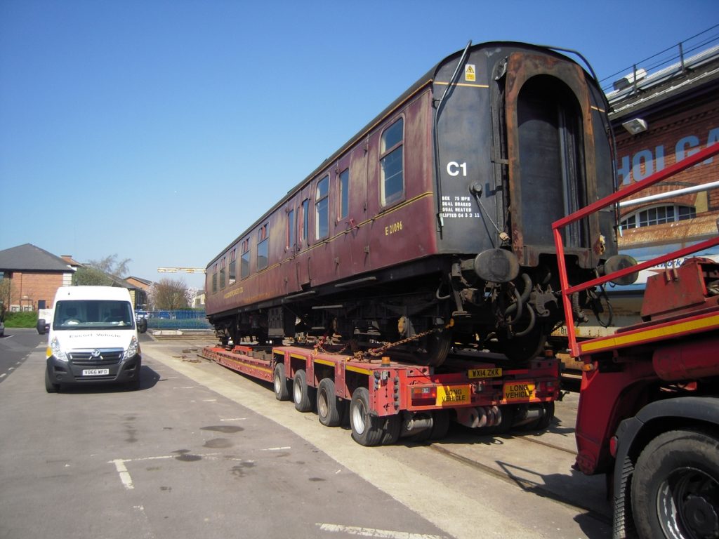 At the Holgate Engineering Works the coach is winched on to the low loader. 