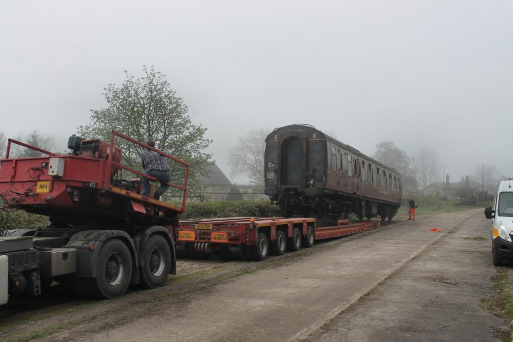 At Cranmore the coach is winched off the low loader.