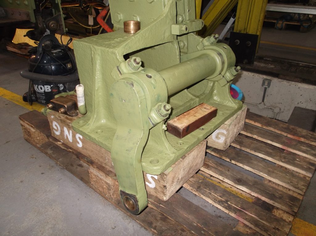 The base of a locomotive reverser on a wooden pallet