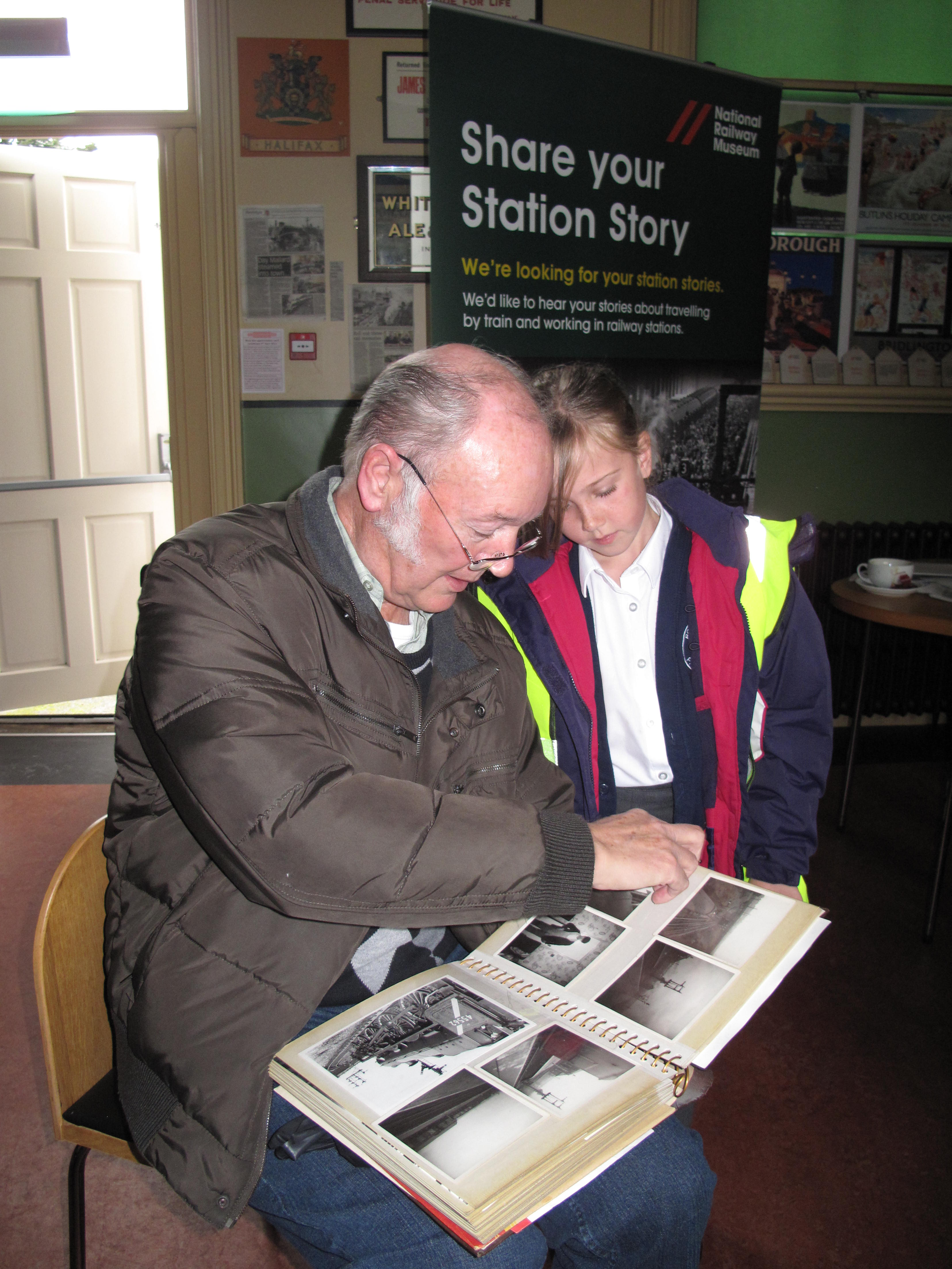 A former fireman shows photos from his time on the railways.