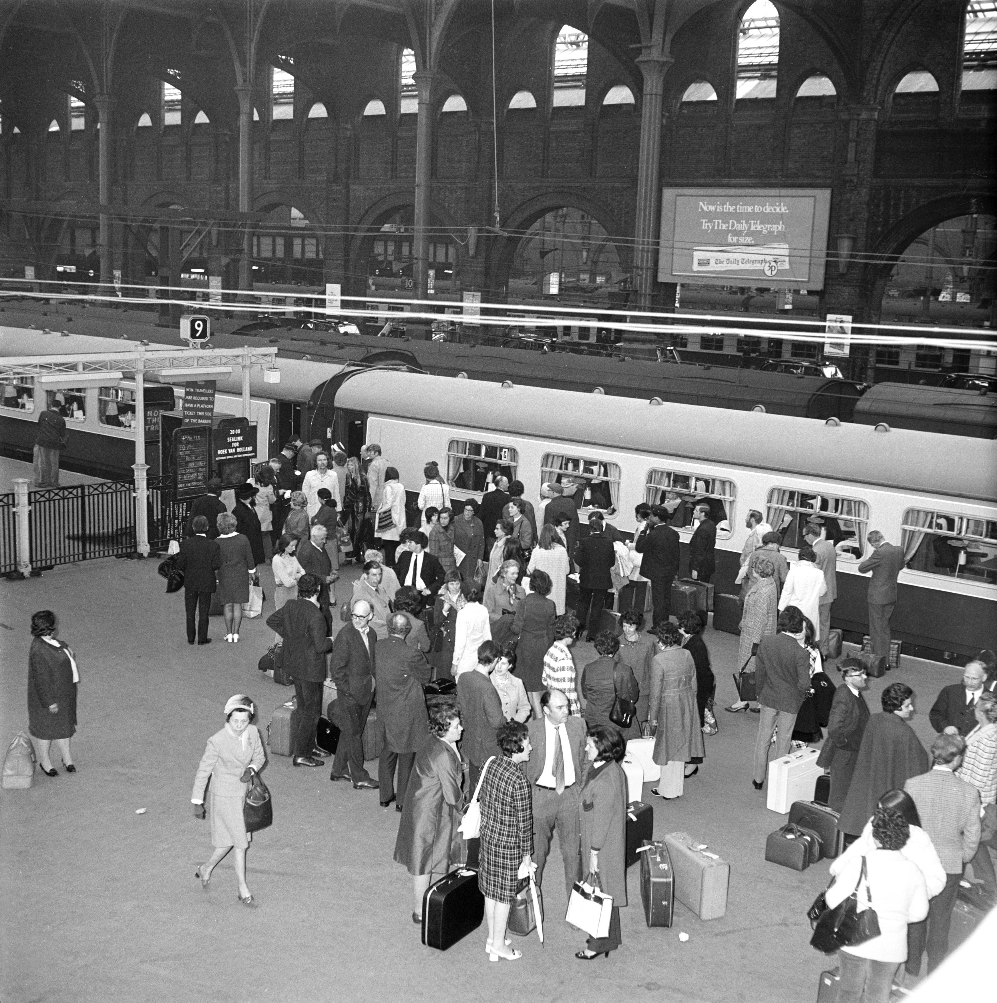 Passengers boarding the 'Hook continental' train at Liverpool Street station, London.