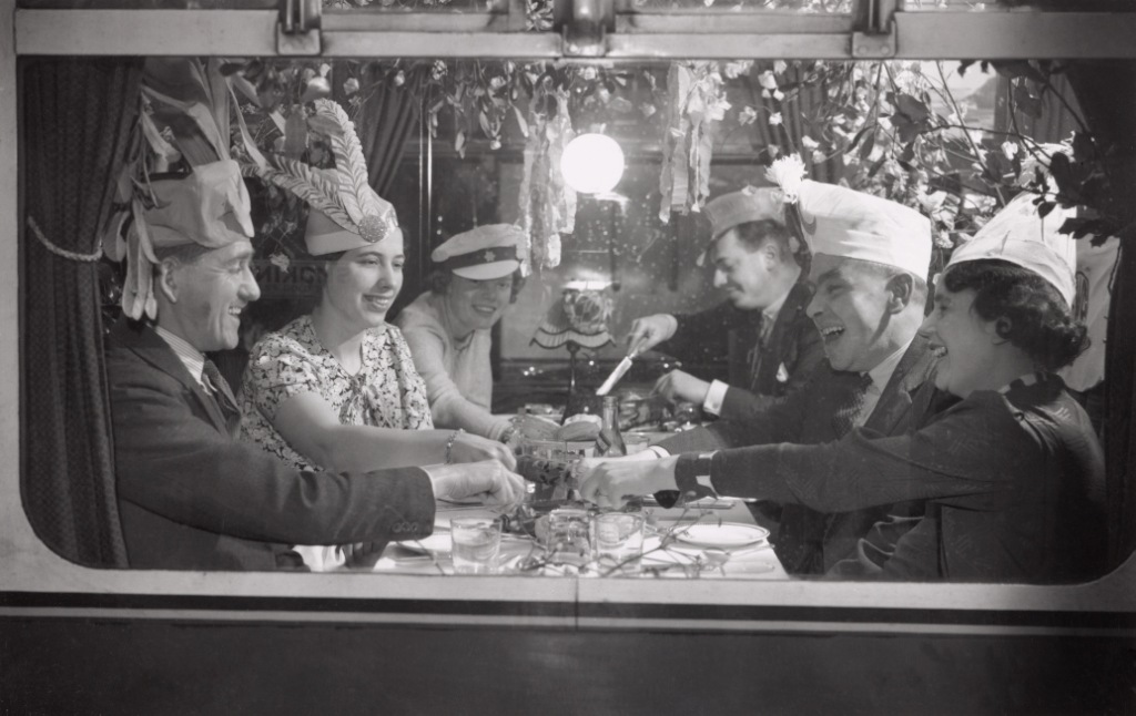 Rail passengers eating Christmas dinner, 18 December 1936. © National Railway Museum / SSPL