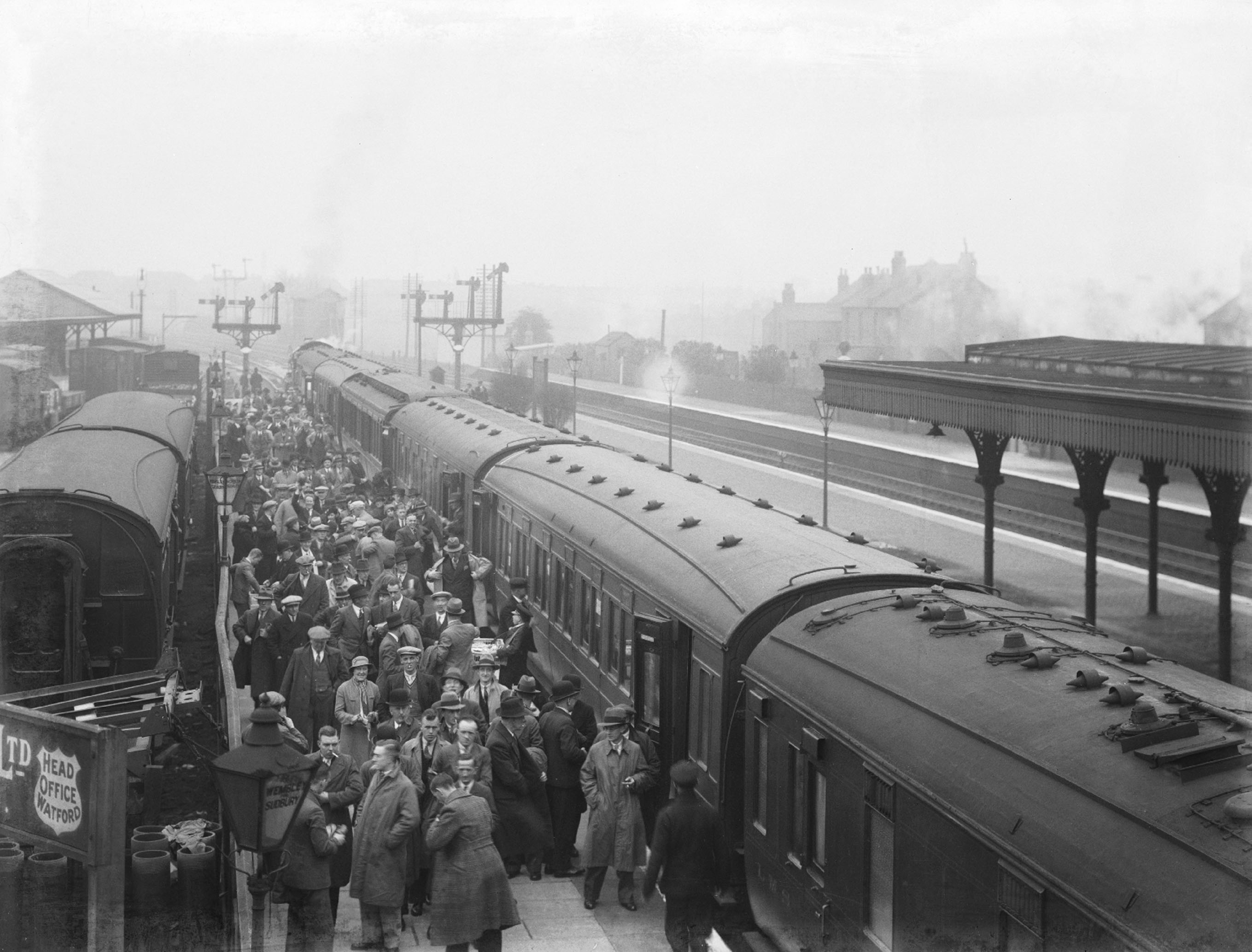 Fans take the train to cup glory, at the new Wembly sation. 
