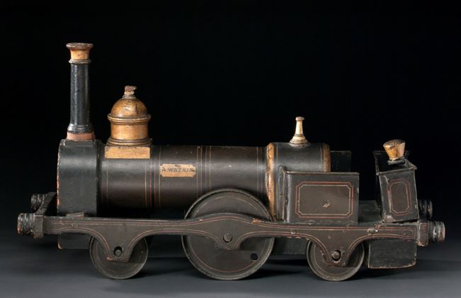 Wooden toy locomotive made for railway promoter Sir Edward Watkin for his son Alfred in 1866 by the South Eastern Railway Workshops. Such push along toys were the staple of the toy train world until the 1890's. NRM Image No. 10446189 