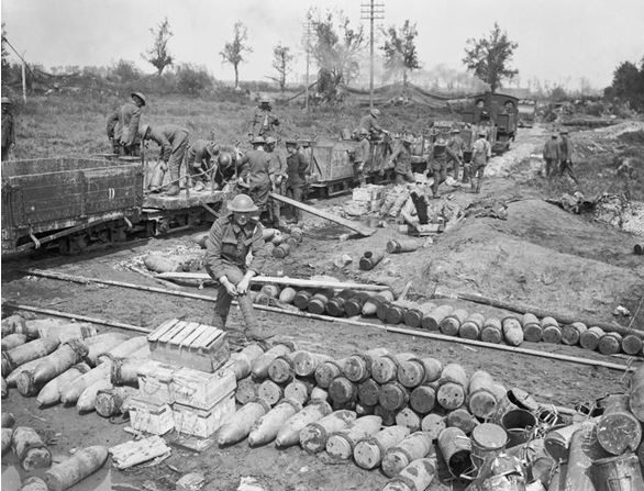 Unloading shells from a light railway train at Brielen, August 1917 © IWM (Q 5855)
