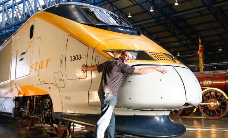 The author, Chris McCandless-Stone, with his beloved Eurostar power car, pictured in Great Hall on 20 October 2015. Chris was responsible for bringing the power cab to the National Railway Museum on behalf of Eurostar.