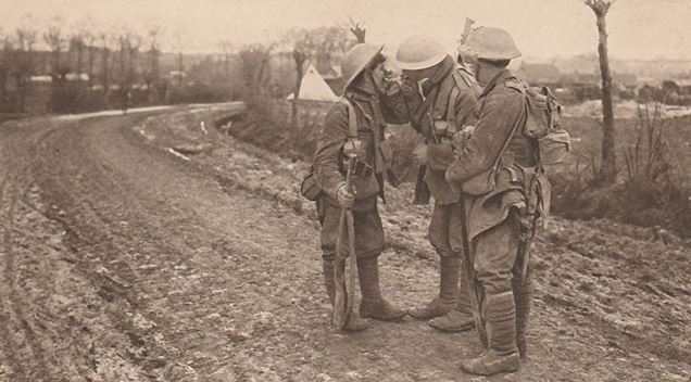British soldiers lighting up after battle. (Postcard from author's collection)
