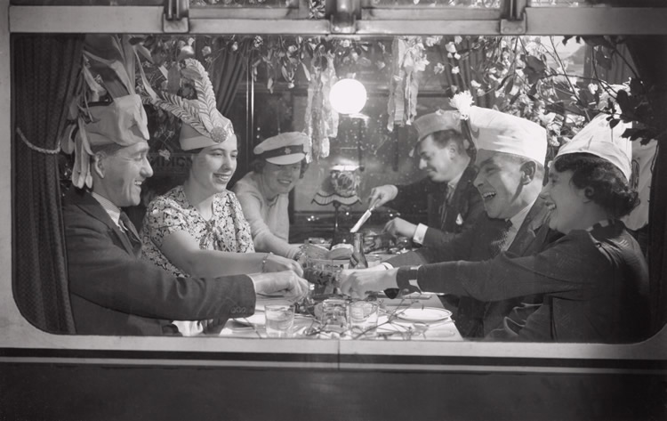 Rail passengers eating Christmas dinner, 18 December 1936. Photograph by Edward G Malindine. (Img Ref:10318088)