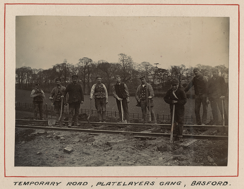 Navvies laying a temporary track at Basford