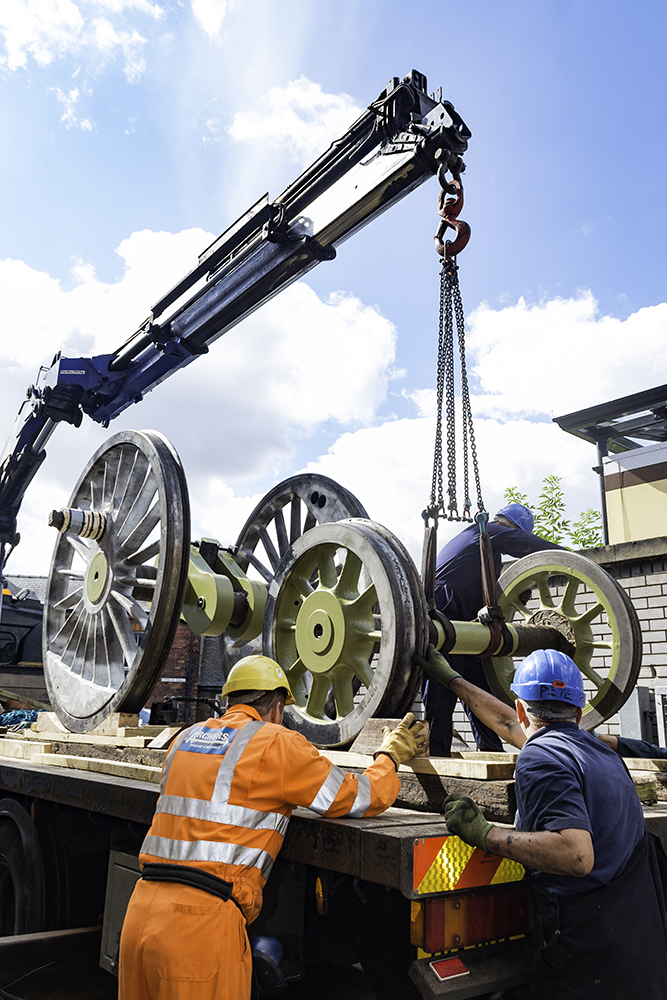The first bogie wheelset was loaded using the truck's crane after the workshop crane failed