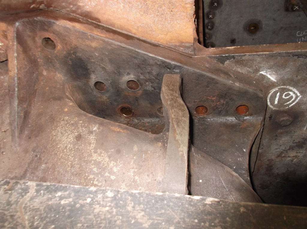 The top leading corner of the right hand cylinder. The footplating has been cut back to allow access to the bolts which have now been removed. New bolts will be fitted.