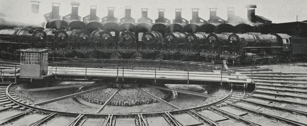 Liberation class locomotives outside a roundhouse. [Ref: VUL/3/7]