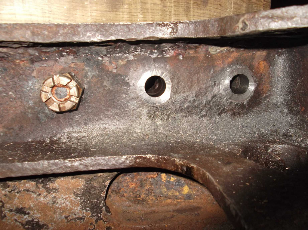 Two holes have been spotfaced and are nearly ready for new fitted bolts
