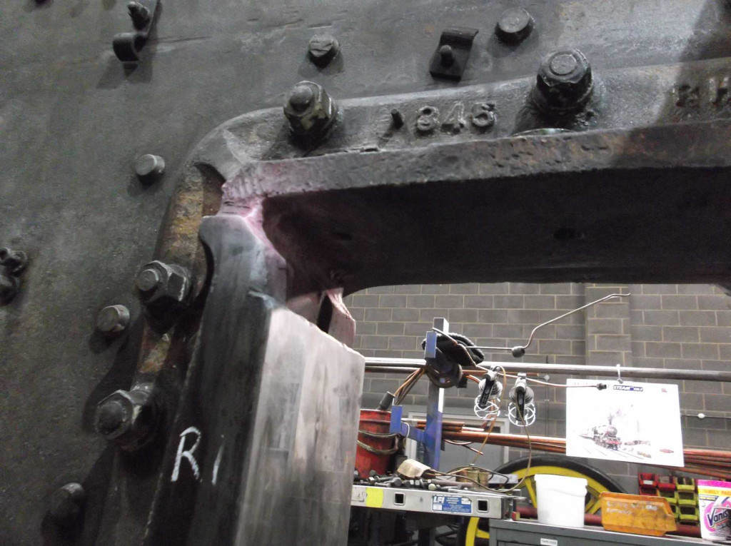 The horn castings were examined for cracks this week. The top corners are areas likely to be affected by fatigue cracks. The casting surfaces are rough and careful inspection is required. Inspections are always carried out by two people to ensure nothing is missed. This is the right leading horn casting viewed from inside the frames.