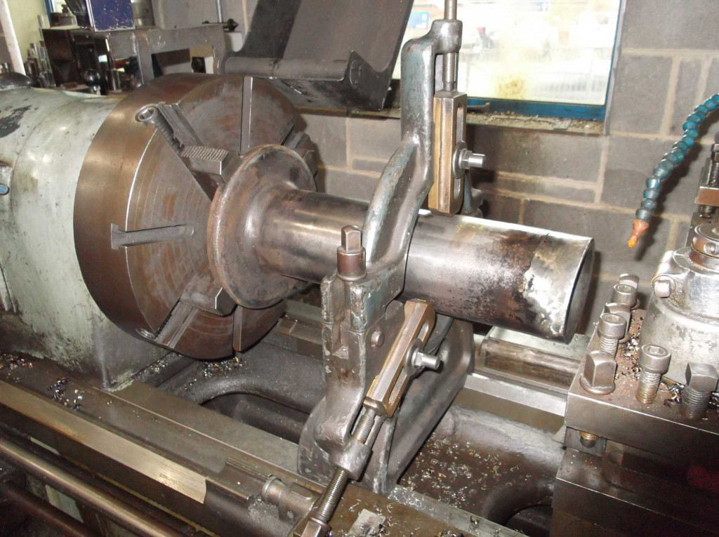 The inner left-hand buffer sleeve in the 1946 vintage Holbrook Model B No. 21 lathe, in the National Railway Museum workshop. The wear to the front of the sleeve that projects from the buffer housing can be seen.