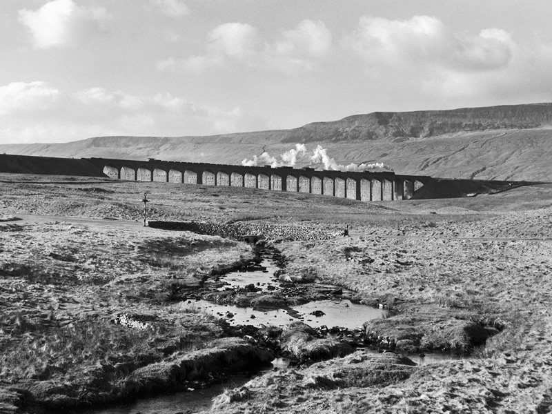 A goods train crossing the Ribblehead Viaduct, North Yorkshire, c 1950s