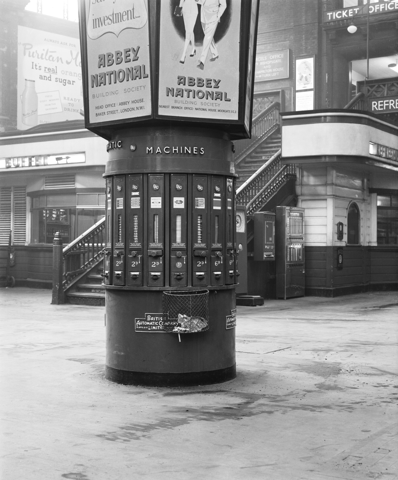 Vending machines in a British Railways Eastern Region station, 1956.
