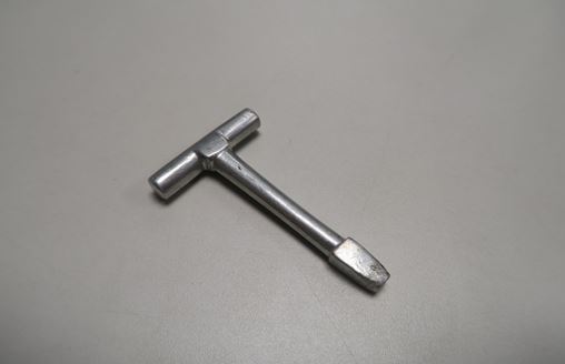 A T-shaped Carriage key stored in our Warehouse (C7; DU1), which was made from the aluminium taken from the wreckage of a German Zeppelin brought down during World War One at Potters Bar.