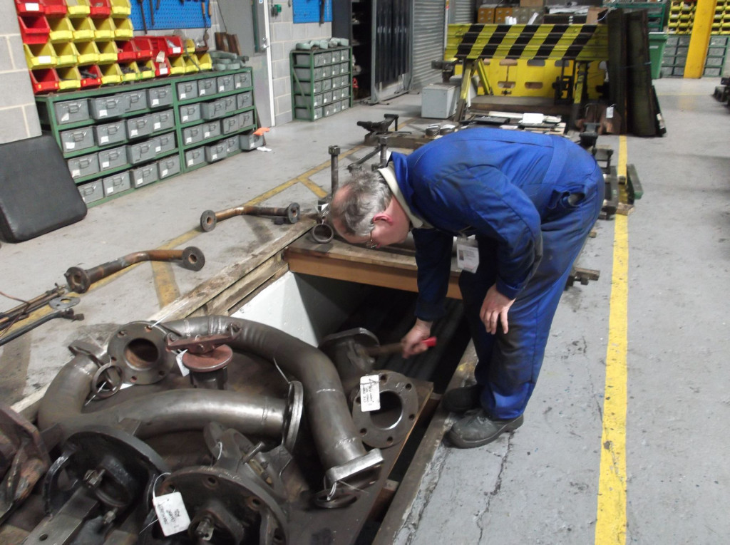 Our Cheif Mechanical Engineer Richard Swales examining the main steam pipes.