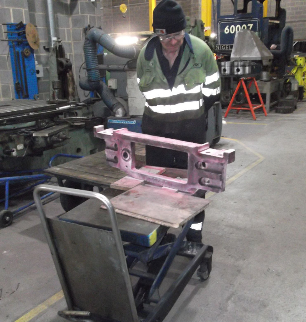 The trailing left coupled wheel hornstay is examined by Phil Slater.