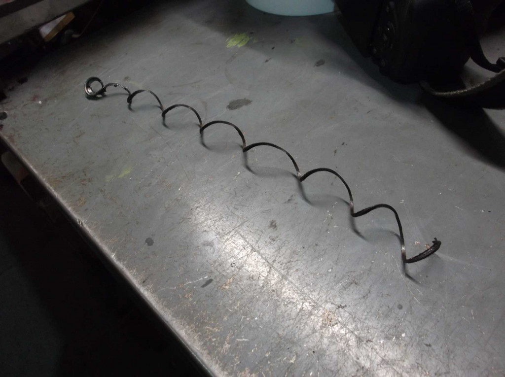 The middle cylinder cover stud drilling jig allowed accurate drilling out of the core of the studs leaving the thread behind, which was pulled out intact.