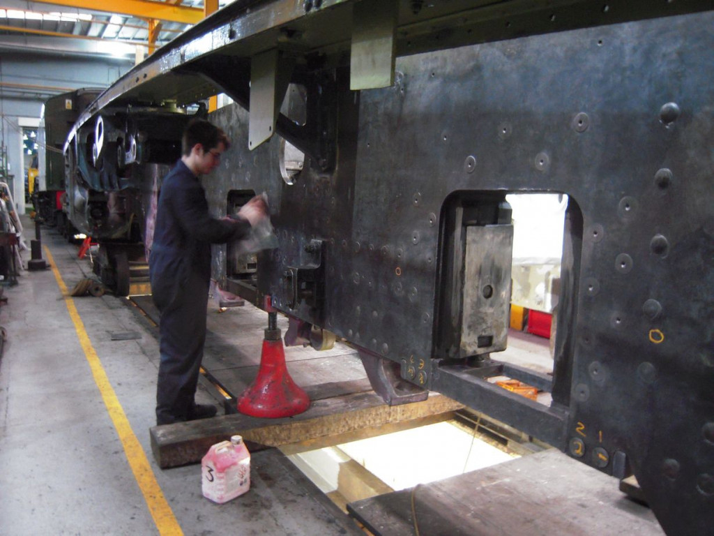 The painting of the outside of the main frame plates was started this week. Will Morgan makes a start with final wipe over before applying the primer.