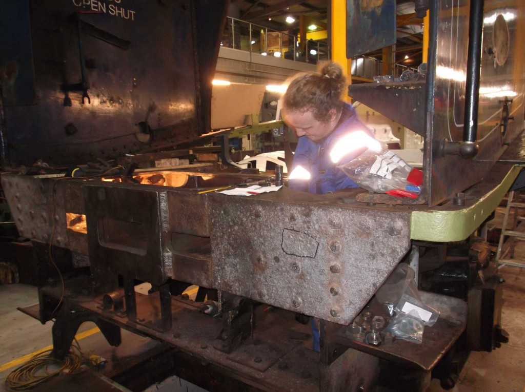 Getting an accurate measurement from the dragbox reamed holes for the fitted bolts isn't easy so we call in Tom Crone who can use a micrometer and fits in the gap.