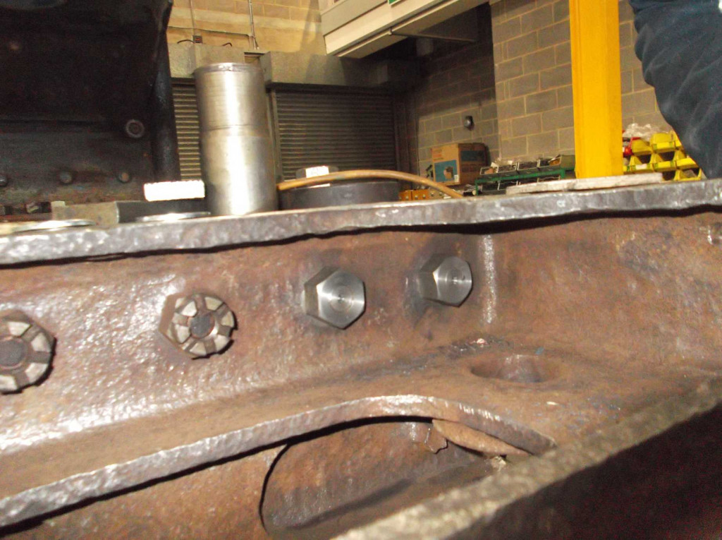 The first two new fitted bolts in the dragbox. Washers are yet to be fitted under the nuts and then they will be torqued.