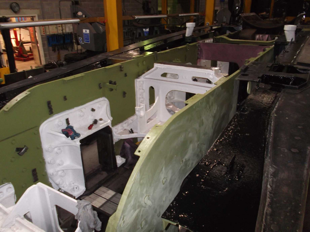 The splasher brackets along the top of the frames are now all fully secured and have received a coat of primer.