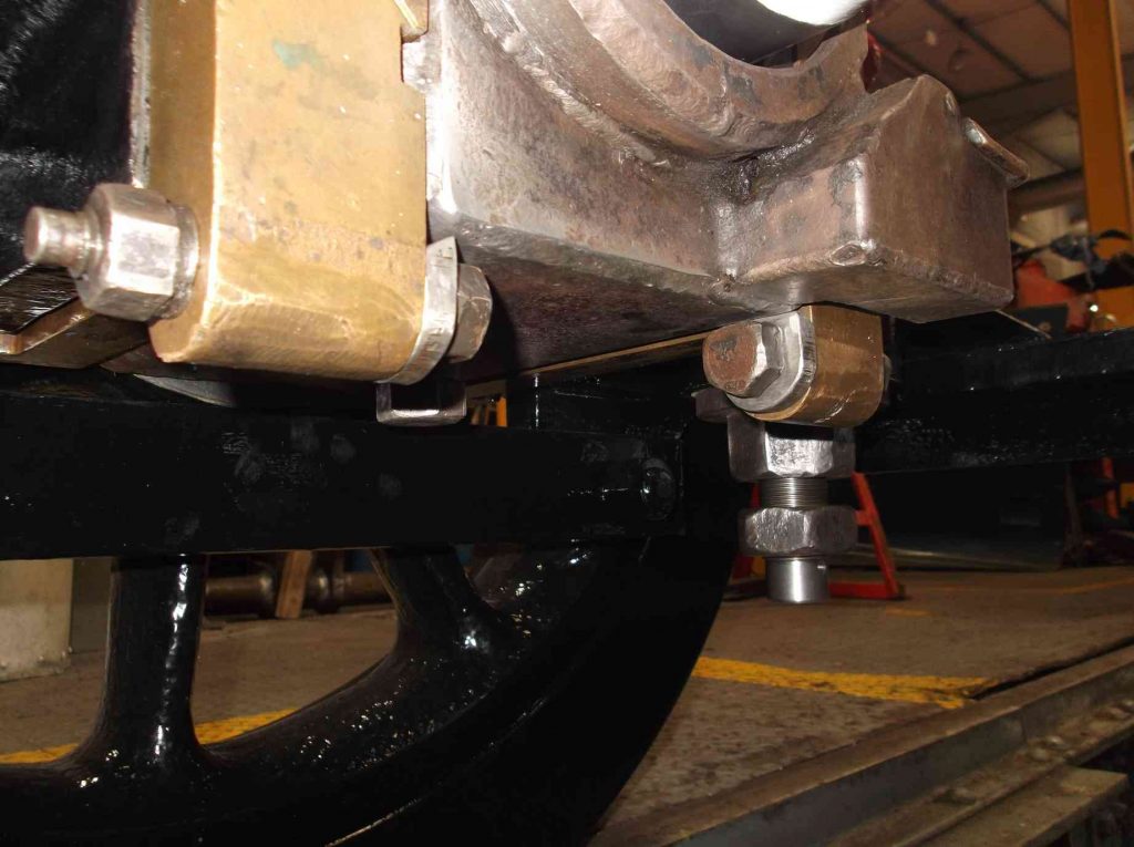 The lugs on the bogie axlebox underkeep trays have been carefully cut off
