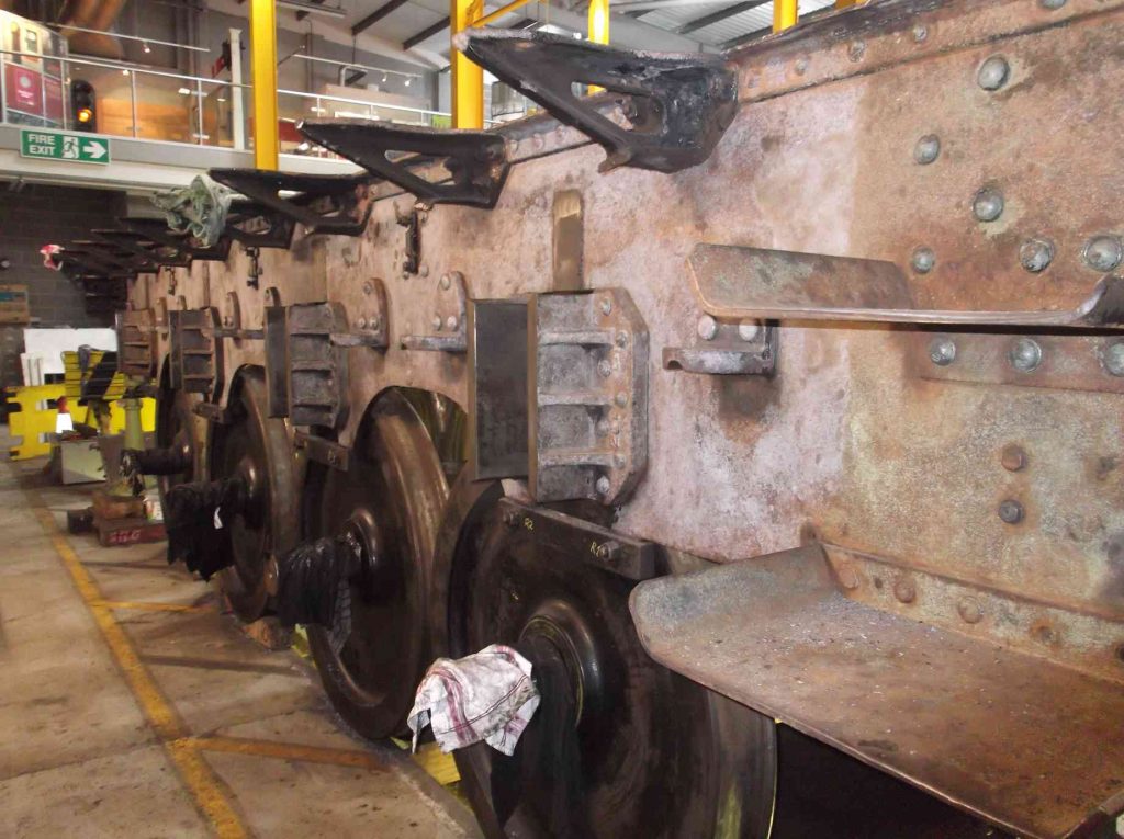 Outside of the tender main frames of locomotive Sir Nigel Gresley, stripped back to metal.