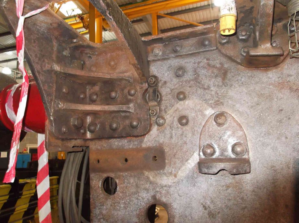 The trailing outside right of the tender frames with all paint and scale removed.