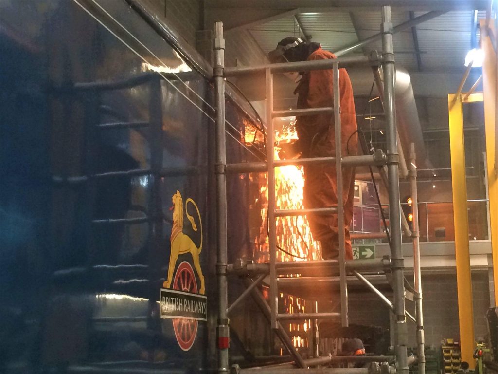 Sections of corroded steel are cut out