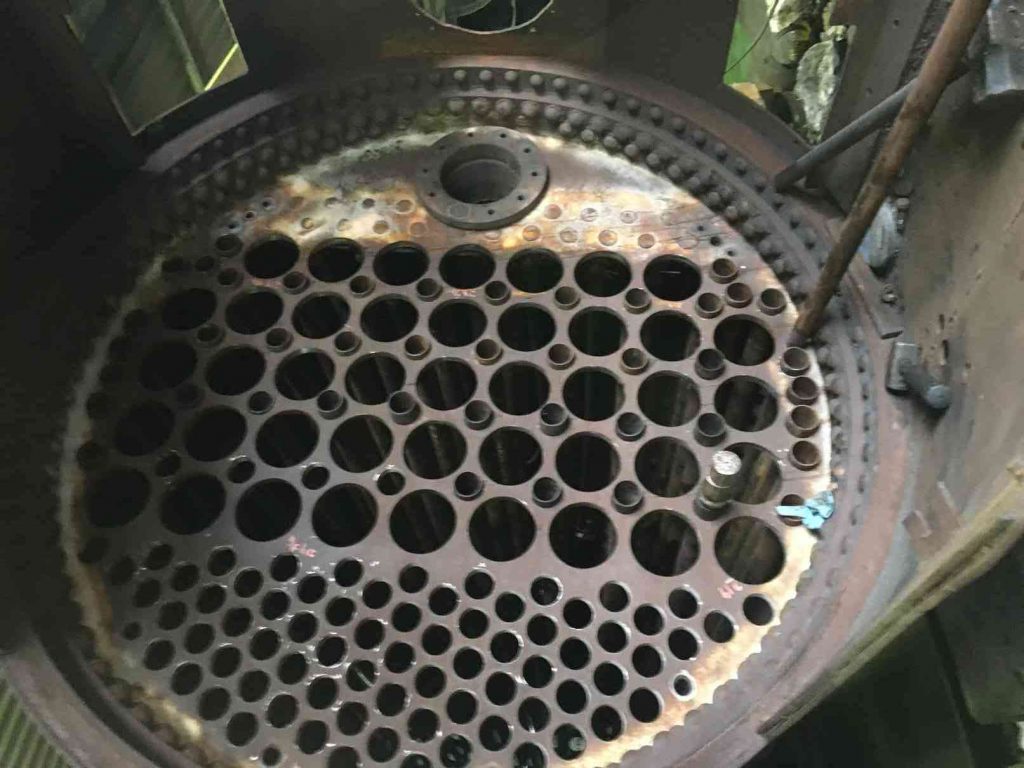 Locomotive boiler with small tubes being fitted.