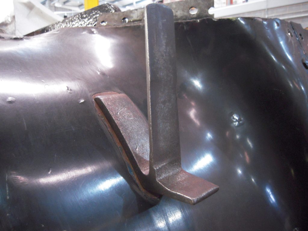 The heavily worn front lamp irons