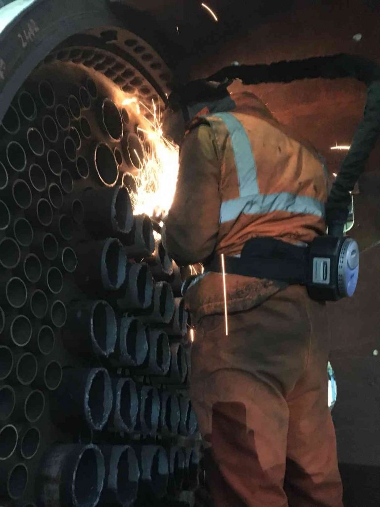 The flue tubes are trimmed to length