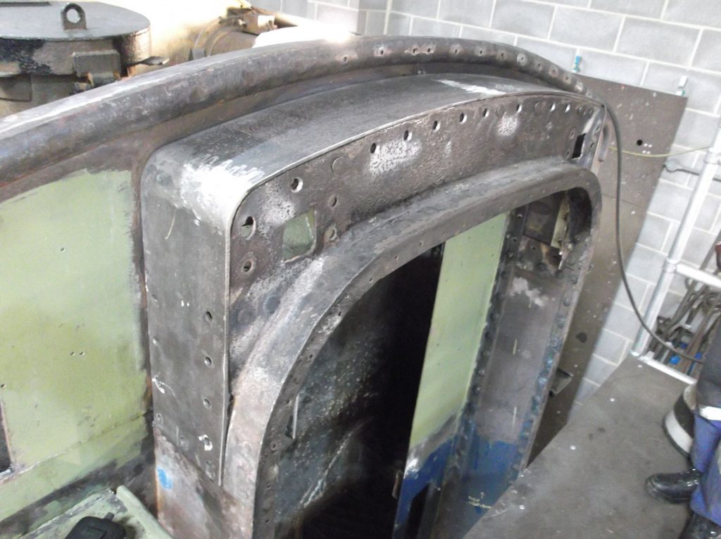 The tender vestibule arch fabrication in place