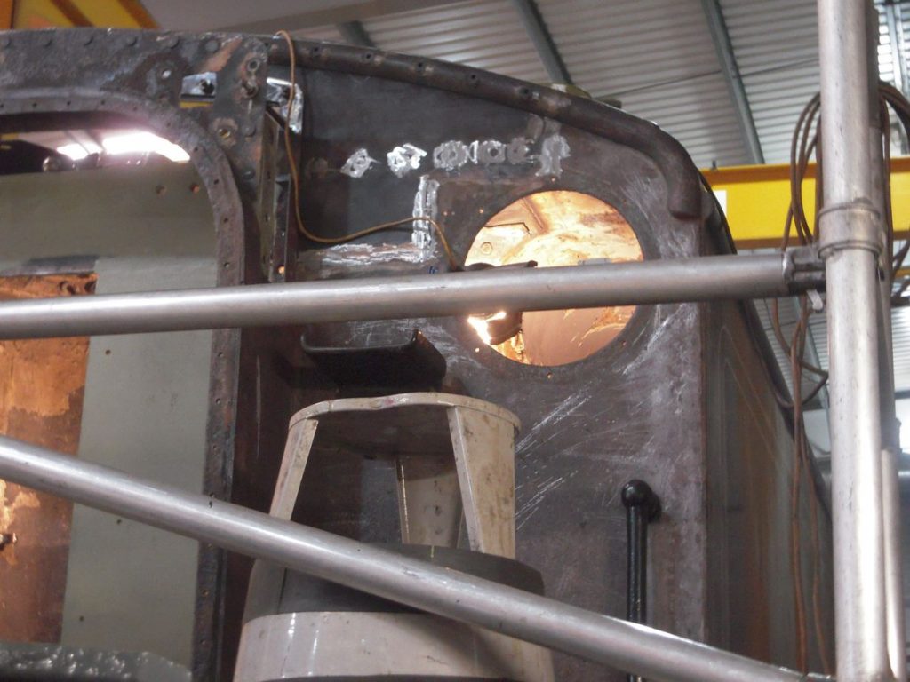 The top corner of the tender where new plate has been welded in