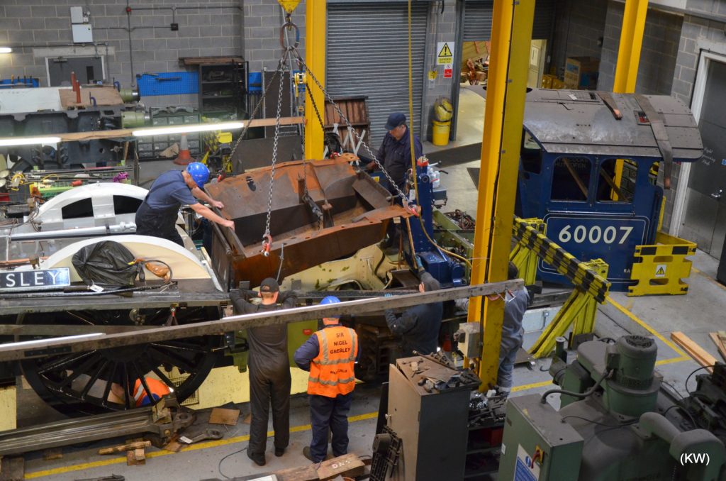 The ashpan is lowered into the frames