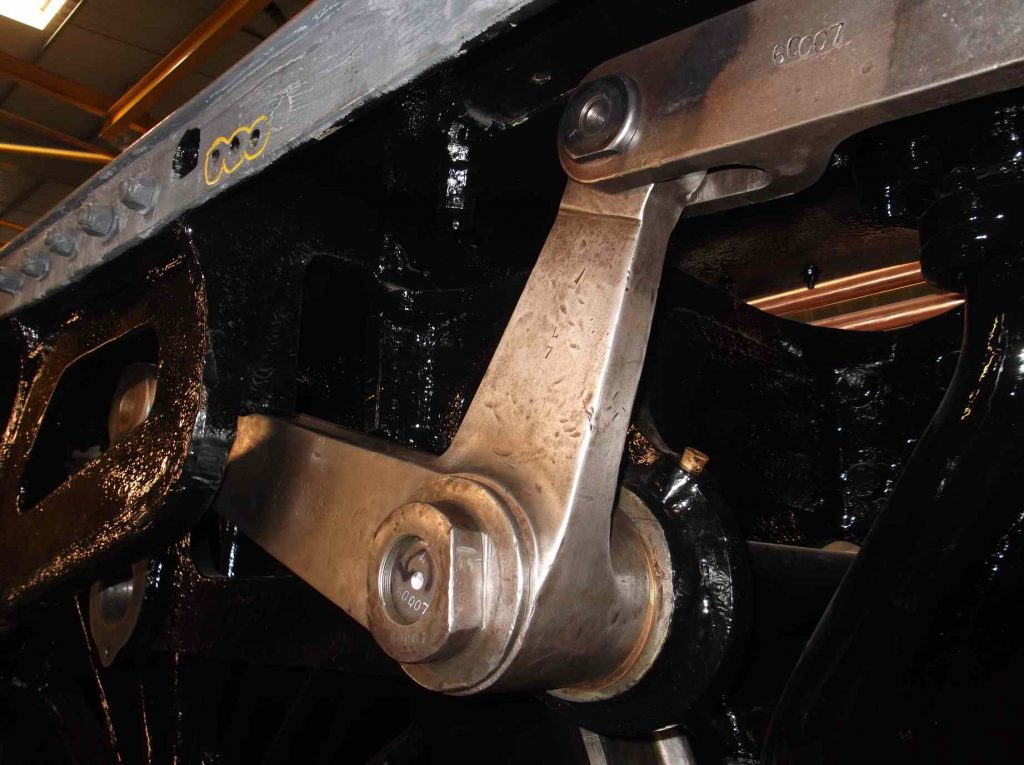 The reversing assembly lifting arm