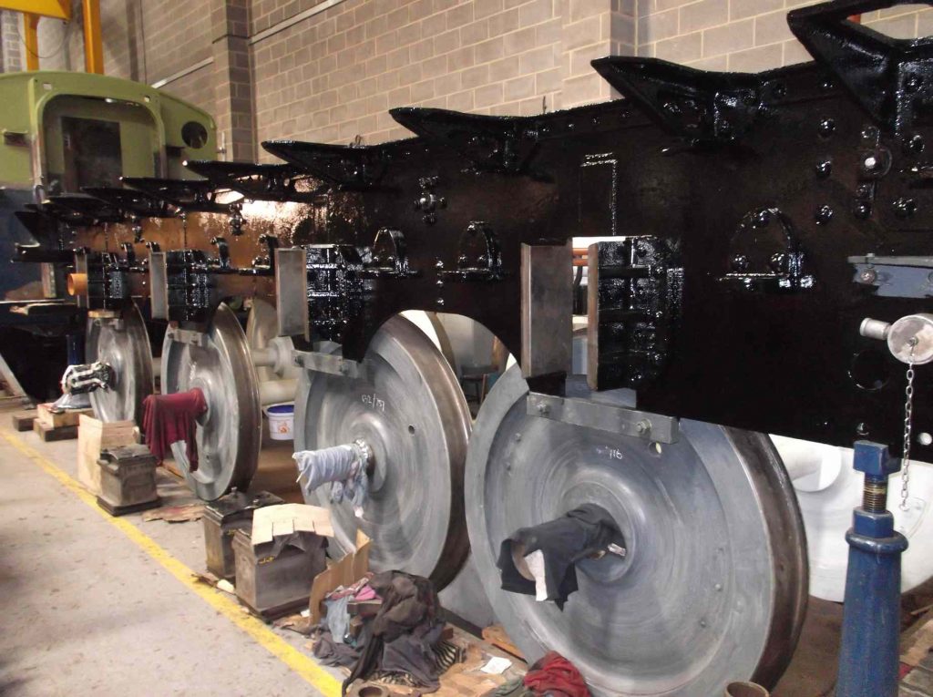 Locomotive tender frames painted black.