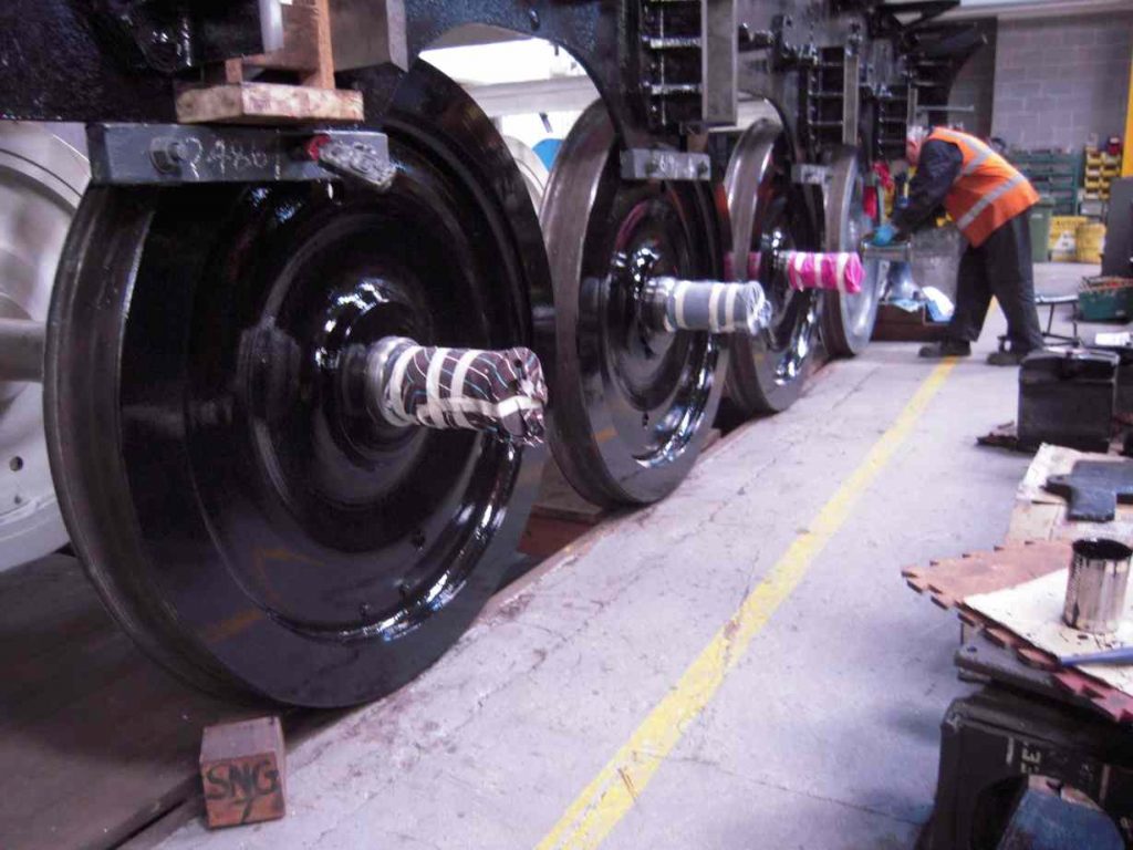 The tender frames and wheels are painted