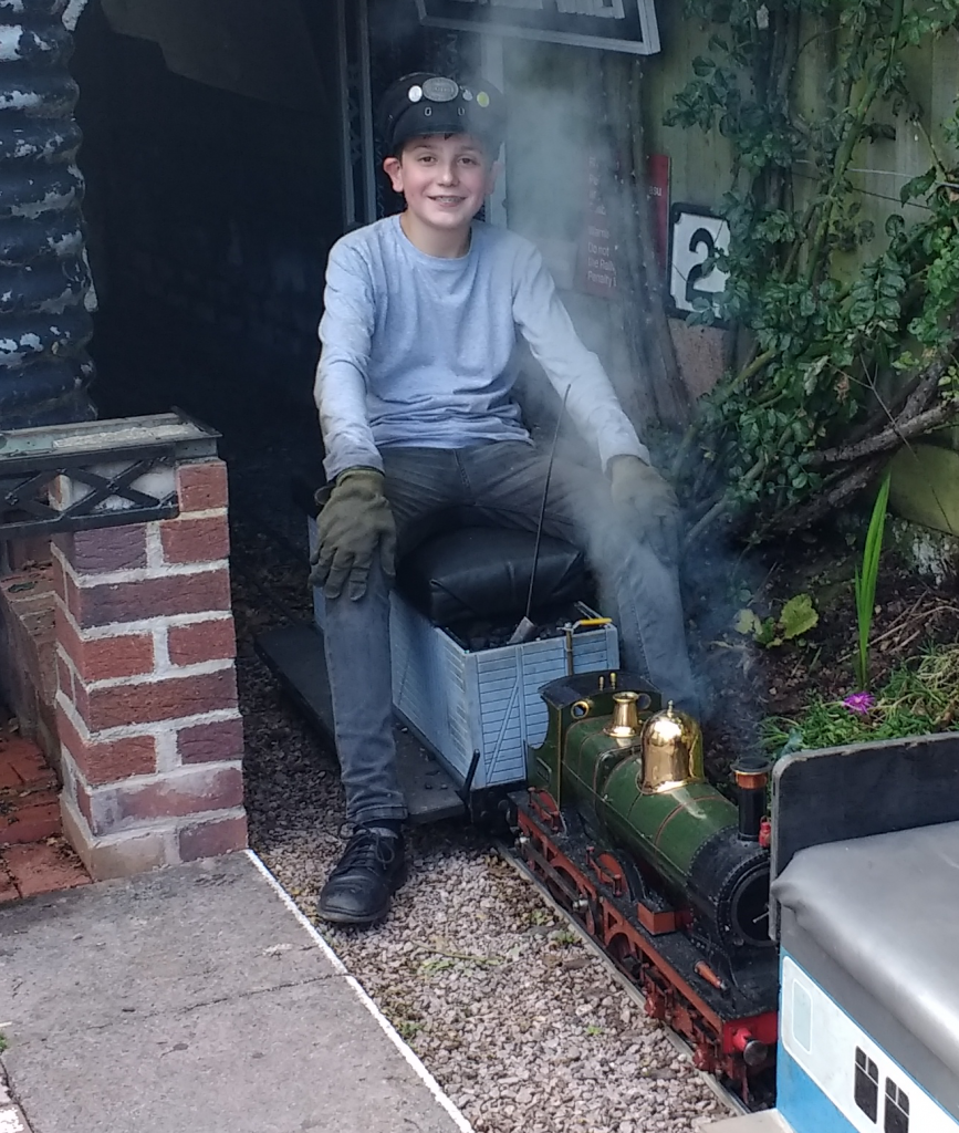 Matthew sat on a loco