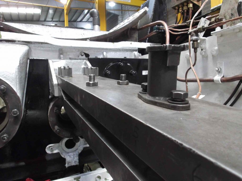 The middle slidebars are fitted and secured with new bolts