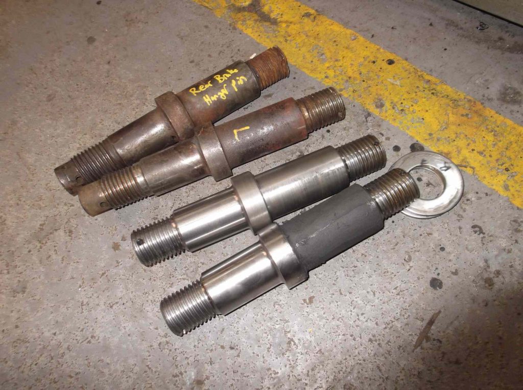 New and old brake hanger pins