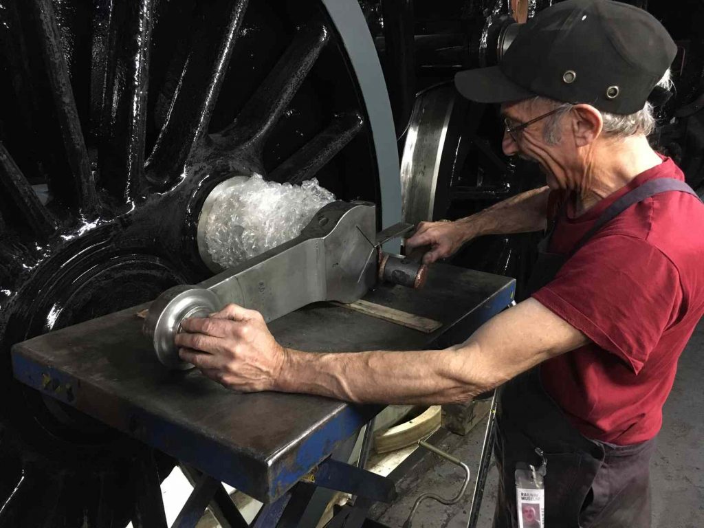 The right return crank being fitted on to its crankpin