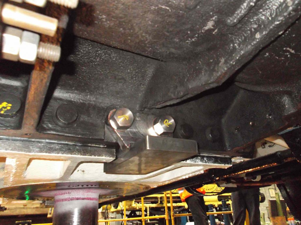 One of the loco side-bearers fitted in place below the outside cylinders