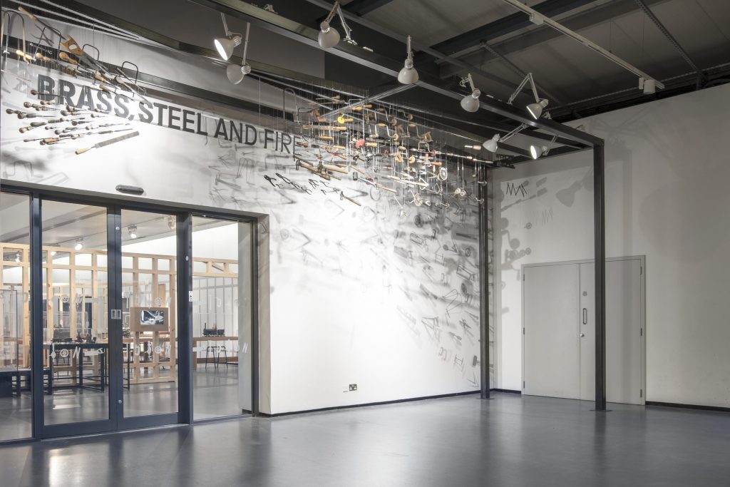 The sculpture at the entrance to Brass, Steel and Fire