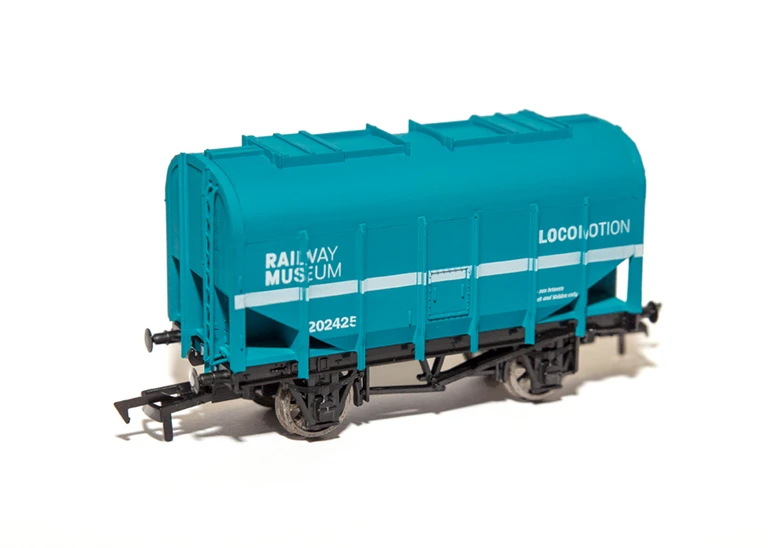Bright teal wagon with Railway Museum and Locomotion printed in white