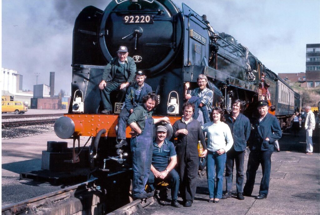 The locomotive service team stand proudly in front of Evening Star